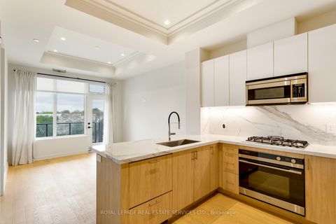 Photo 3 at 307 - 123 Maurice Drive, CO Central, Oakville