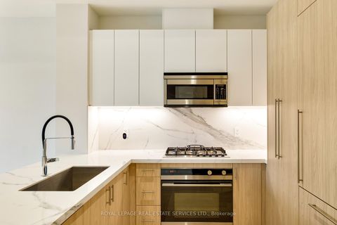 Photo 5 at 307 - 123 Maurice Drive, CO Central, Oakville