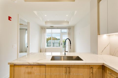 Photo 7 at 307 - 123 Maurice Drive, CO Central, Oakville