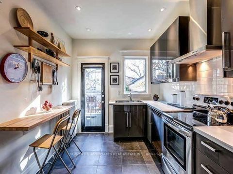 Photo 8 at 13 Sutherland Avenue, Crescent Town, Toronto