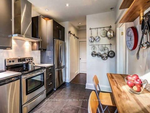 Photo 9 at 13 Sutherland Avenue, Crescent Town, Toronto