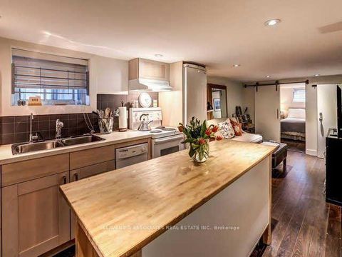 Photo 15 at 13 Sutherland Avenue, Crescent Town, Toronto