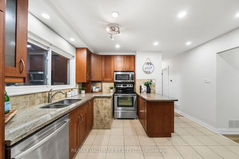 Photo 11 at 17 Dunsfold Drive, Malvern, Toronto