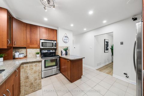 Photo 12 at 17 Dunsfold Drive, Malvern, Toronto