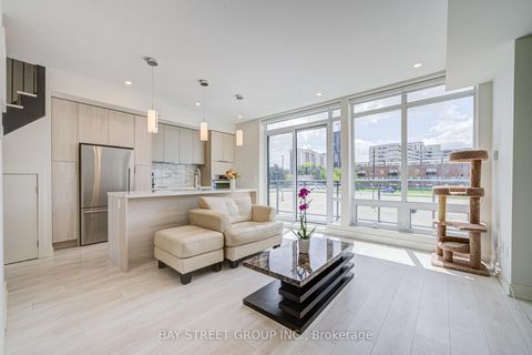 Photo 3 at 27 Sonic Way, Flemingdon Park, Toronto