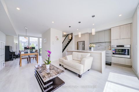 Photo 4 at 27 Sonic Way, Flemingdon Park, Toronto