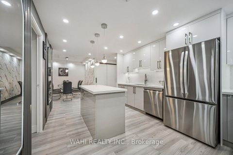 Photo 3 at 1003 - 299 Mill Road, Markland Wood, Toronto