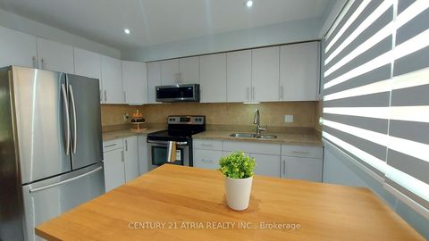 Photo 8 at 143 Purpledusk Trail, Morningside, Toronto