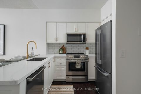 Photo 8 at 701 - 1 Deer Park Crescent, St. Clair, Toronto