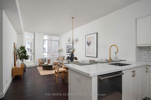 Photo 11 at 701 - 1 Deer Park Crescent, St. Clair, Toronto