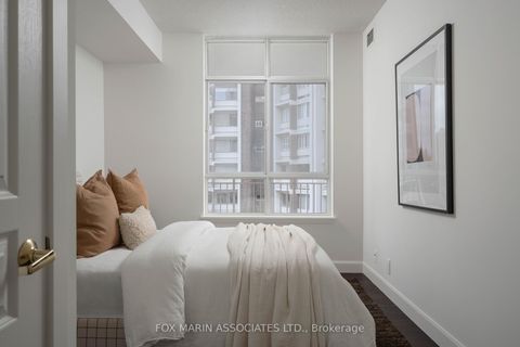 Photo 21 at 701 - 1 Deer Park Crescent, St. Clair, Toronto