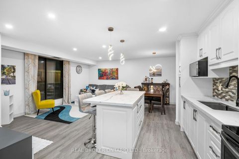 Photo 7 at 102 - 1200 Bridletowne Circle, L'Amoreaux, Toronto