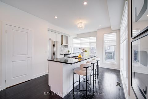 Photo 5 at 187 Salterton Circle, Maple, Vaughan