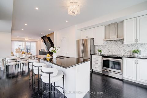 Photo 6 at 187 Salterton Circle, Maple, Vaughan