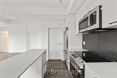 Photo 2 at TH13 - 40 Ed Clark Gardens Boulevard, Pellam Park, Toronto