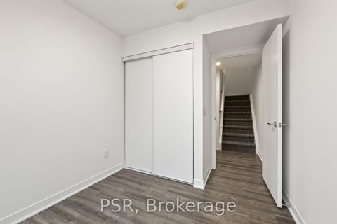 Photo 9 at TH13 - 40 Ed Clark Gardens Boulevard, Pellam Park, Toronto