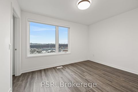 Photo 12 at TH13 - 40 Ed Clark Gardens Boulevard, Pellam Park, Toronto