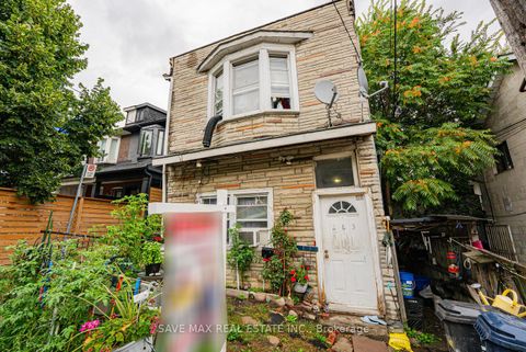 Photo 1 at 283 Rhodes Avenue E, Coxwell, Toronto