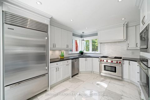 Photo 7 at 31 Modesto Gardens, Islington Woods, Vaughan