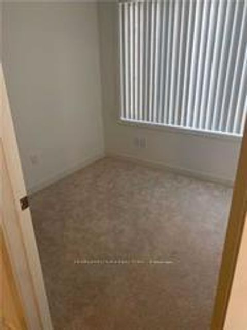 Photo 7 at 15 - 40 Orchid Place, Malvern, Toronto