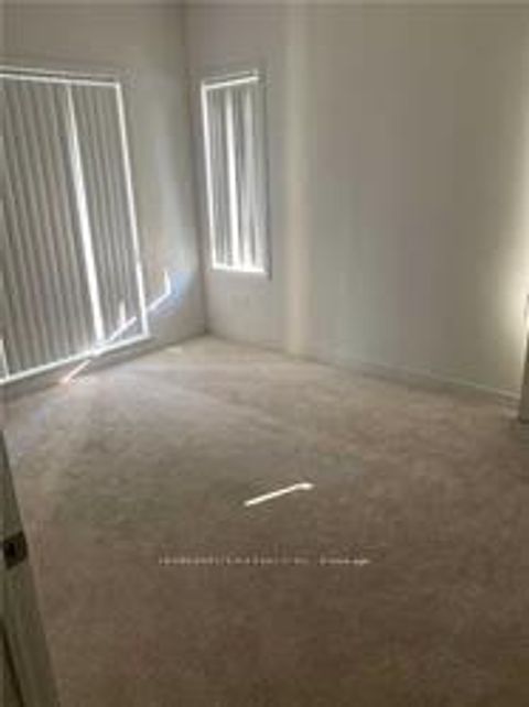 Photo 8 at 15 - 40 Orchid Place, Malvern, Toronto