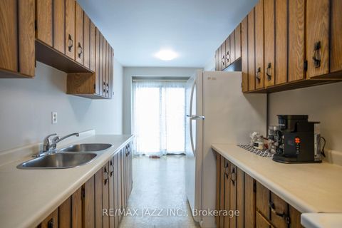 Photo 10 at 77 Caronia Square, Malvern, Toronto