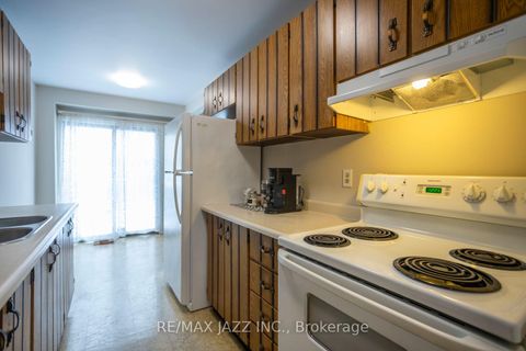 Photo 11 at 77 Caronia Square, Malvern, Toronto