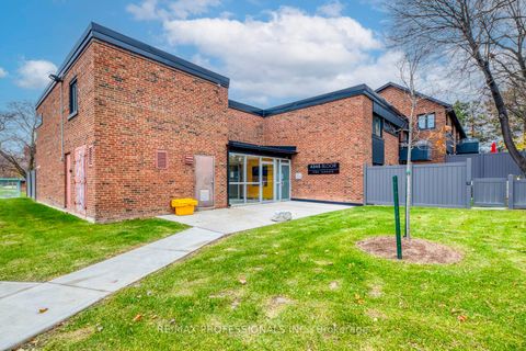 Photo 1 at 51 - 4345 Bloor Street W, Markland Wood, Toronto