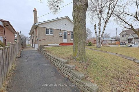 Photo 1 at 9 Guiness Avenue, Clairville, Toronto