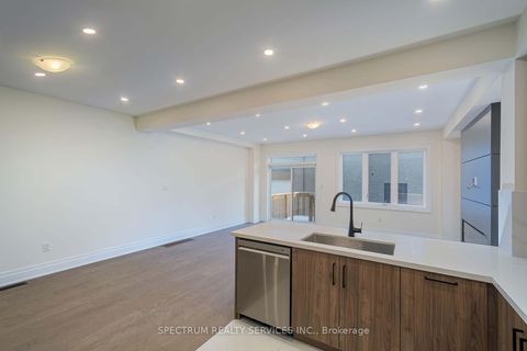 Photo 12 at 203 Grand Trunk Avenue, Patterson, Vaughan