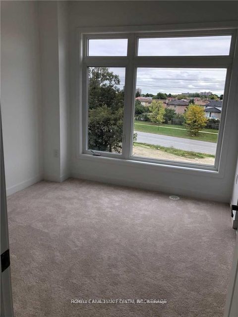 Photo 5 at 21 Beliveau Street, Vaughan Grove, Vaughan