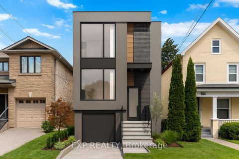 Photo 0 at 132 Barrington Avenue, Crescent Town, Toronto
