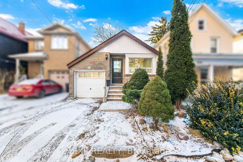 Photo 2 at 132 Barrington Avenue, Crescent Town, Toronto