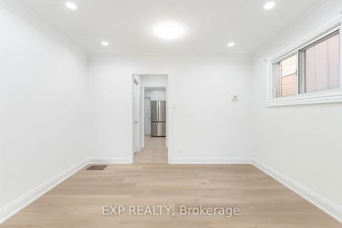 Photo 7 at 132 Barrington Avenue, Crescent Town, Toronto