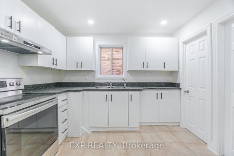 Photo 11 at 132 Barrington Avenue, Crescent Town, Toronto