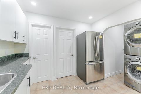 Photo 13 at 132 Barrington Avenue, Crescent Town, Toronto