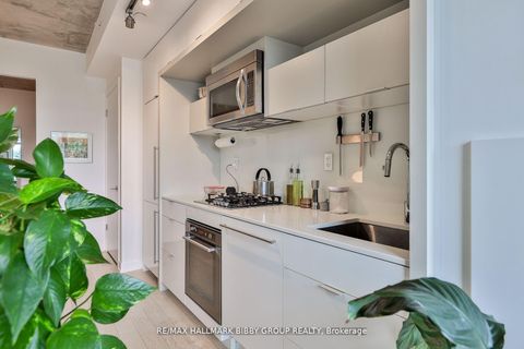 Photo 10 at 309 - 130 Rusholme Road, Dufferin Grove, Toronto