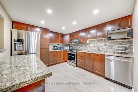 Photo 9 at 9 Benlight Crescent, Woburn, Toronto