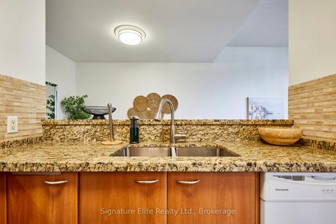 Photo 5 at TH128 - 38 Lee Centre Drive, Woburn, Toronto