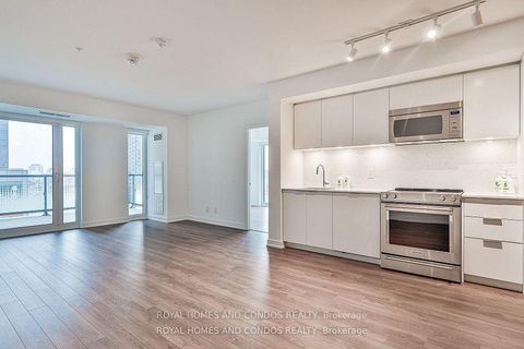 Photo 3 at 402 - 30 Samuel Wood Way, City Centre West, Toronto