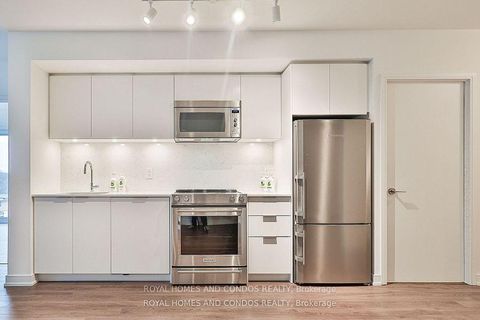 Photo 8 at 402 - 30 Samuel Wood Way, City Centre West, Toronto