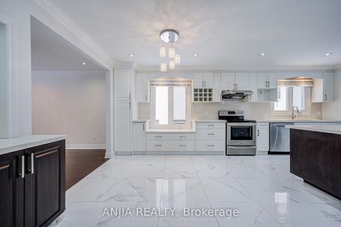 Photo 12 at 26 Longbow Square, Steeles, Toronto