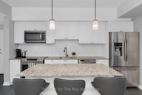 Photo 5 at 309 - 300 ESSA Road, 400 West, Barrie