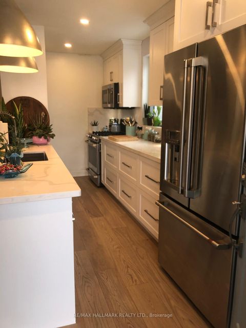 Photo 7 at 203 Elmhurst Avenue, Westgate, Toronto