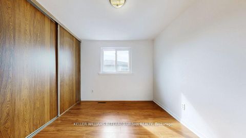 Photo 19 at 15 Thistlewaite Crescent, Malvern West, Toronto