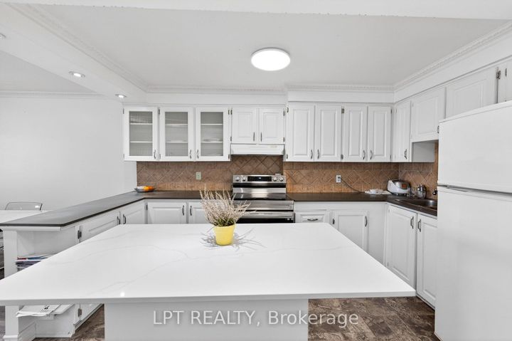 Photo 10 at 103 - 3040 Constitution Boulevard, Applewood, Mississauga