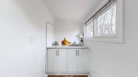 Photo 18 at 34 Merrian Road, Kennedy Park, Toronto