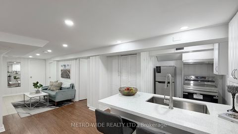 Photo 31 at 34 Merrian Road, Kennedy Park, Toronto