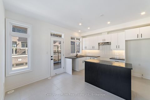 Photo 5 at 36 - 260 Melody Common, RO River Oaks, Oakville