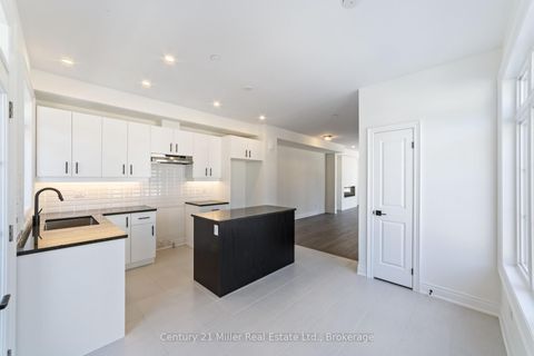 Photo 6 at 36 - 260 Melody Common, RO River Oaks, Oakville